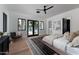 Bright bedroom with private access to the backyard pool, stylish decor, and plenty of natural light at 7014 E Palo Verde Ln, Paradise Valley, AZ 85253