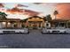 Charming home exterior featuring symmetrical design, brick accents, and inviting entrance with wood pergola at 7014 E Palo Verde Ln, Paradise Valley, AZ 85253