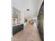 Stylish hallway bar area with sleek cabinets, wine storage, and views into the living room at 7014 E Palo Verde Ln, Paradise Valley, AZ 85253