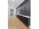 Long hallway featuring elegant built-in cabinets and countertops, with ample storage at 7014 E Palo Verde Ln, Paradise Valley, AZ 85253