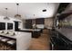 Beautiful kitchen featuring a double island, light wood cabinets, and stainless steel appliances at 7014 E Palo Verde Ln, Paradise Valley, AZ 85253