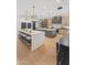 Open-concept kitchen with double islands, a breakfast bar, stainless steel appliances, and hardwood floors at 7014 E Palo Verde Ln, Paradise Valley, AZ 85253