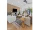 Bright and airy living room with comfortable seating, stylish decor, and a modern ceiling fan at 7014 E Palo Verde Ln, Paradise Valley, AZ 85253
