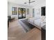 Bright bedroom with hardwood flooring, stylish rug, and plenty of natural light at 7014 E Palo Verde Ln, Paradise Valley, AZ 85253