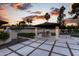 Outdoor kitchen featuring sleek design, modern appliances, and integrated lighting for evening entertainment at 7014 E Palo Verde Ln, Paradise Valley, AZ 85253