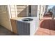 Exterior view of the home showing the air conditioning unit at 834/837 S Beryl/Aquamarine Dr, Apache Junction, AZ 85119