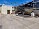 Park model home featuring a large RV and an outdoor patio at 834/837 S Beryl/Aquamarine Dr, Apache Junction, AZ 85119