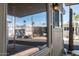 Bright image showcasing neighborhood views through clear windows, highlighting palm trees under a sunny sky at 834/837 S Beryl/Aquamarine Dr, Apache Junction, AZ 85119