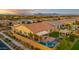 Aerial shot showcasing a backyard oasis with a private pool, covered patio, and lush landscaping at 10455 E Thatcher Ave, Mesa, AZ 85212
