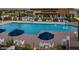 Community pool with shaded seating at 10455 E Thatcher Ave, Mesa, AZ 85212