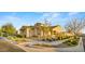 Beautiful home exterior showcases a neutral color palette, desert landscaping, and well-maintained surroundings at 10455 E Thatcher Ave, Mesa, AZ 85212