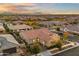 Well-maintained home with a three-car garage, landscaped front yard, and a desirable neighborhood location at 10455 E Thatcher Ave, Mesa, AZ 85212