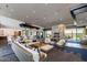 Spacious lounge area with a fireplace and ample seating at 10455 E Thatcher Ave, Mesa, AZ 85212