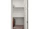 Bright and airy walk-in closet, with simple shelving for organization at 10455 E Thatcher Ave, Mesa, AZ 85212