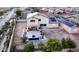 Aerial view of house, featuring a large backyard with a fire pit and an ample patio area for entertaining at 11737 N 143Rd Dr, Surprise, AZ 85379