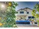 Charming backyard featuring mature trees, a patio, and a pool at 11737 N 143Rd Dr, Surprise, AZ 85379