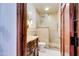 Elegant bathroom with a decorative vanity, walk-in shower, and high-end finishes for a luxurious spa-like experience at 11737 N 143Rd Dr, Surprise, AZ 85379