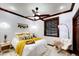 Cozy bedroom with a comfortable bed, stylish decor, and soft lighting, creating a warm and inviting atmosphere at 11737 N 143Rd Dr, Surprise, AZ 85379