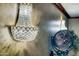 Close up of the chandelier and decorative lighting at 11737 N 143Rd Dr, Surprise, AZ 85379