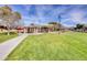 A community park offers a picnic area, a playground, green space, and pedestrian pathways at 11737 N 143Rd Dr, Surprise, AZ 85379