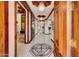 Spacious home foyer with marble floors, a decorative ceiling, and ornate wood trim at 11737 N 143Rd Dr, Surprise, AZ 85379