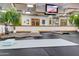 Spacious home gym including rubber floor and mirrored wall with exercise equipment at 11737 N 143Rd Dr, Surprise, AZ 85379
