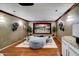 Home theater featuring a large screen, plush seating, and custom lighting, perfect for movie nights and entertainment at 11737 N 143Rd Dr, Surprise, AZ 85379