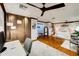 Large main bedroom featuring hardwood floors, ceiling fan and a workstation at 11737 N 143Rd Dr, Surprise, AZ 85379