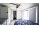 Well-lit bedroom with private bathroom access and outdoor access through a glass door at 1207 E Alice Ave, Phoenix, AZ 85020