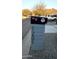 Exterior view of a property including the house number and a decorative mailbox at 1207 E Alice Ave, Phoenix, AZ 85020