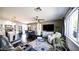 Comfortable living room featuring a dining area, modern decor, and an inviting seating arrangement at 1207 E Alice Ave, Phoenix, AZ 85020