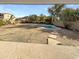 Expansive backyard with a pool and patio area with room for landscaping at 1517 E Piute Ave, Phoenix, AZ 85024