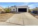 Charming single-story home featuring a desert landscape and attached two-car garage at 1517 E Piute Ave, Phoenix, AZ 85024