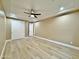 Spacious bedroom featuring recessed lighting, fan, a closet and wood tile floors at 1586 N Himosa Dr, Casa Grande, AZ 85122