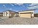 Beautiful single-Gathering home featuring a wide driveway and attached garages at 1586 N Himosa Dr, Casa Grande, AZ 85122