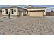 Inviting single-Gathering home featuring a wide driveway and neutral color palette at 1586 N Himosa Dr, Casa Grande, AZ 85122