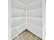 Walk-in pantry featuring ample shelving for organized storage, complemented by tiled flooring at 1586 N Himosa Dr, Casa Grande, AZ 85122