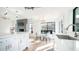Open floor plan features a large island kitchen that flows into an adjacent dining area at 17414 N 56Th Way, Scottsdale, AZ 85254