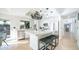 Bright, newly remodeled kitchen features stainless appliances and large center island with seating at 17414 N 56Th Way, Scottsdale, AZ 85254