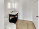 Bathroom with a mirror, updated vanity, and a toilet at 17649 W Young St, Surprise, AZ 85388