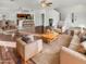 Open concept living room showcases wood floors and lots of natural light at 17649 W Young St, Surprise, AZ 85388