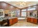 The main bathroom offers dual vanities, a soaking tub, and plenty of natural light at 18215 N Shadow Ct, Surprise, AZ 85374