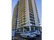 Modern high-rise apartment building with multiple balconies, and ample parking at 207 W Clarendon Ave # 5H, Phoenix, AZ 85013