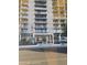 Modern high-rise building boasting multiple floors with individual balconies and a covered entrance at 207 W Clarendon Ave # 5H, Phoenix, AZ 85013