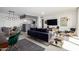 Bright open floor plan living room with views to the dining area at 207 W Clarendon Ave # 5H, Phoenix, AZ 85013