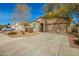 Beautiful single-level home with a well-maintained yard, a cozy entrance, and an attached two-car garage at 21198 W Berkeley Rd, Buckeye, AZ 85396