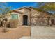 Charming single-Gathering home with a well-manicured lawn, a cozy entrance, and an attached two-car garage at 21198 W Berkeley Rd, Buckeye, AZ 85396