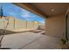 View of the open patio space overlooking the fenced backyard at 21198 W Berkeley Rd, Buckeye, AZ 85396