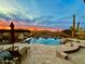Resort style backyard featuring a pool, hot tub and outdoor living space at 2330 N Channing --, Mesa, AZ 85207