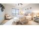 Comfortable bedroom showcasing a ceiling fan, soft carpet, and a queen size bed at 2330 N Channing --, Mesa, AZ 85207